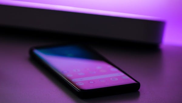 Mobile on purple background